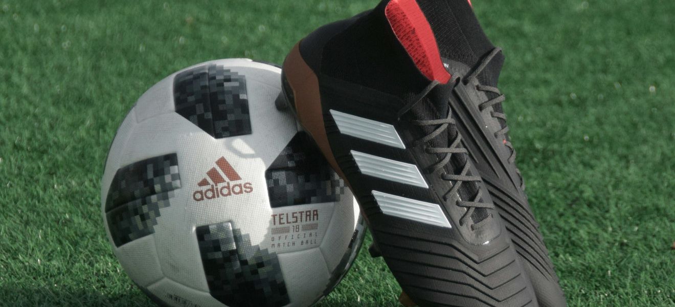 Football boots resting on ball