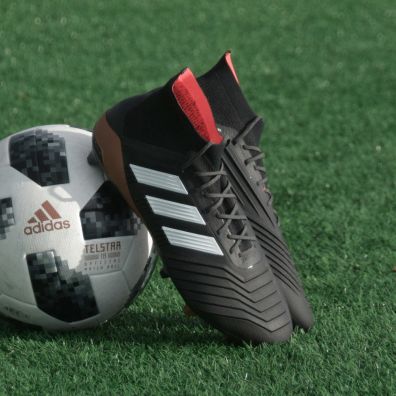 Football boots resting on ball